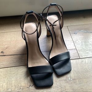 Black leather sandals